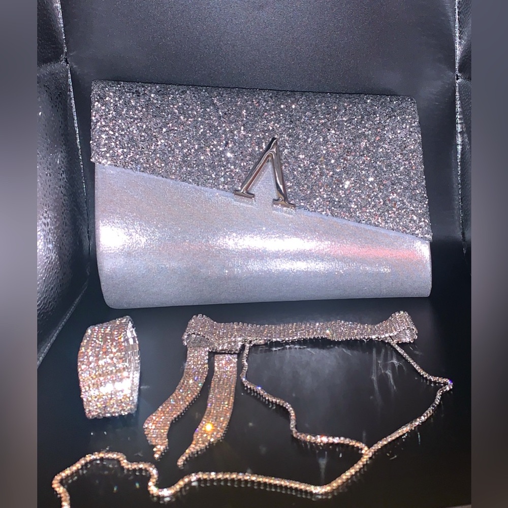 Silver, glitter and chrome clutch purse